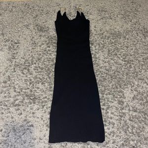 Long black bodycon dress with gold chain straps